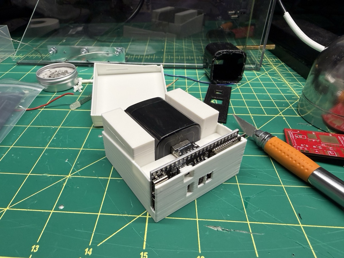 Close-up of the charger seated on the devkit