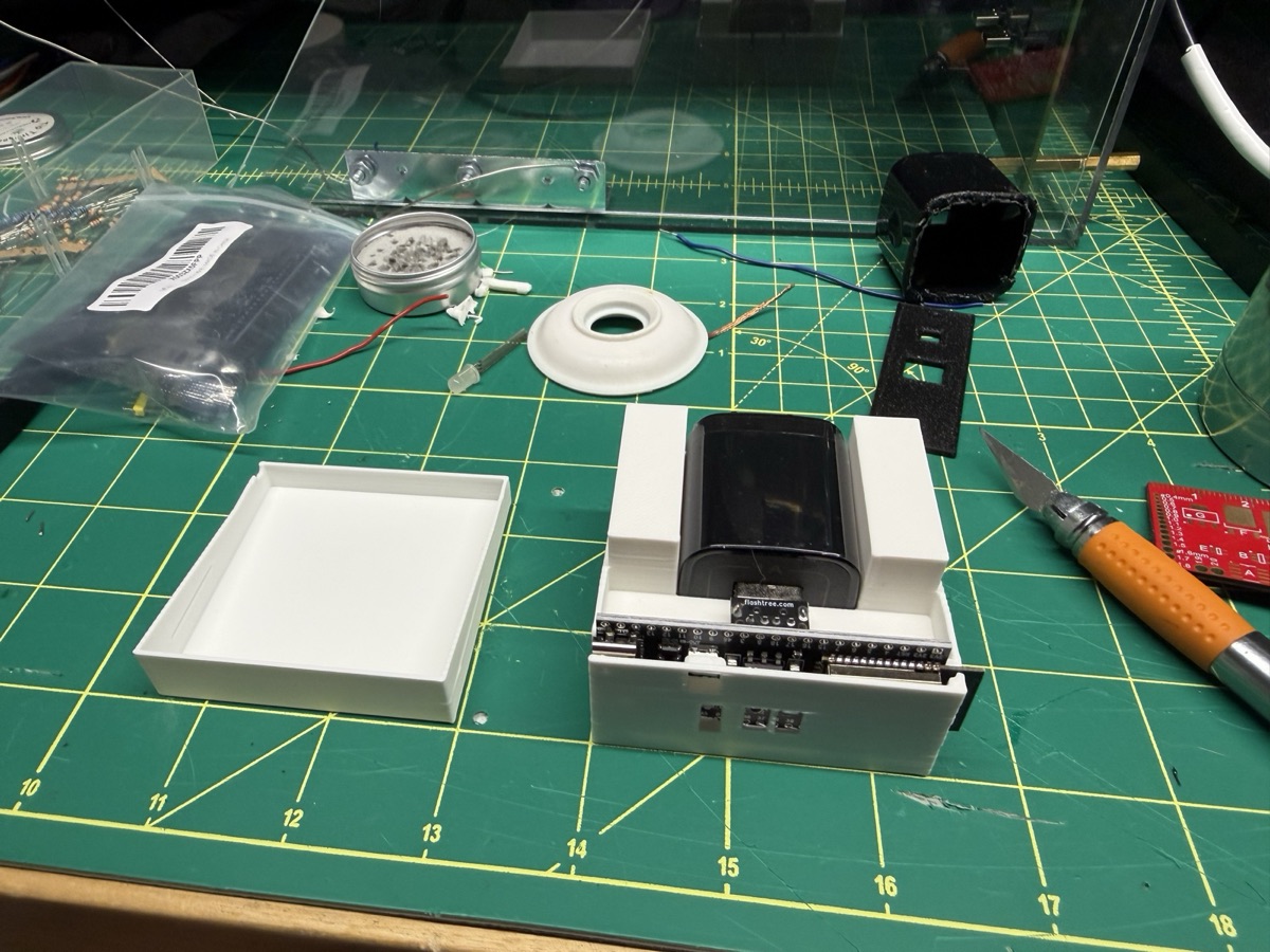 First prototype: devkit and intact USB charger in a white printed box